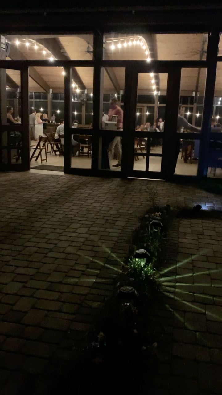 Private event dinner setup inside the Point Preserve pavilion